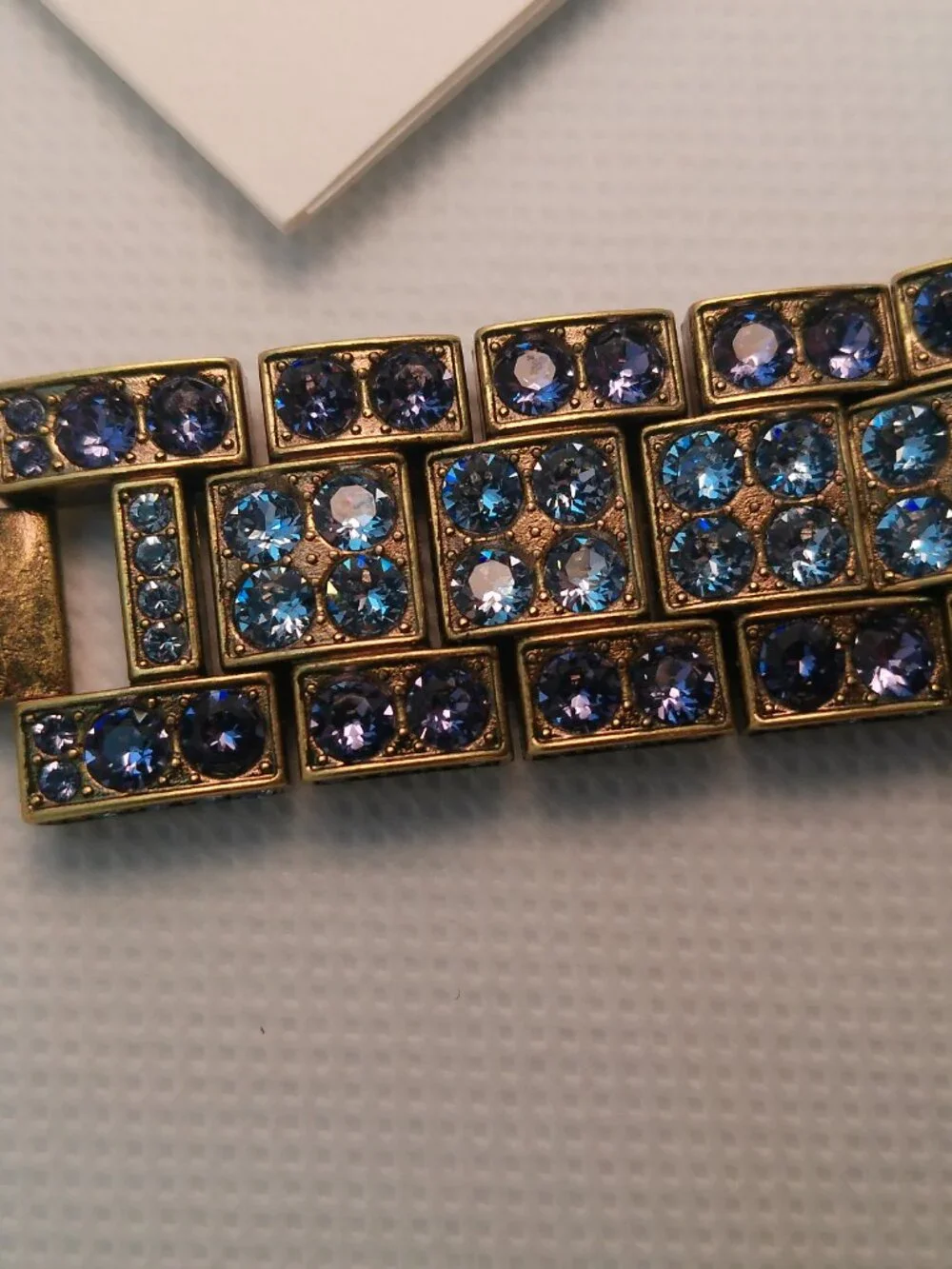 Heidi Daus quartz fashion watch bronze-tone covered with lavender-purple crystal
